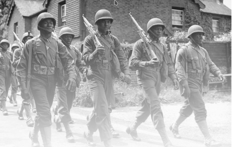 African-American Soldiers in WWII, marching in Europe